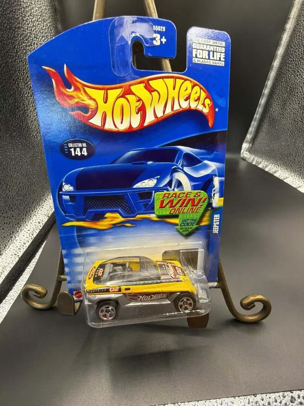 2002 Hot Wheels Jeepster Collector No. 144 Yellow Die-Cast Car